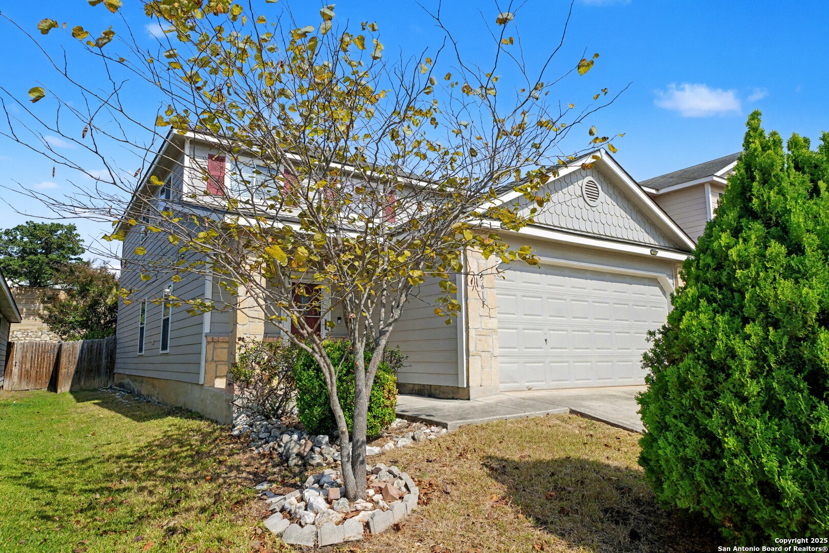 3615 Longhorn Creek San Antonio, TX 78261 - Photo 3 of 42 a backyard of a house with lots of green space