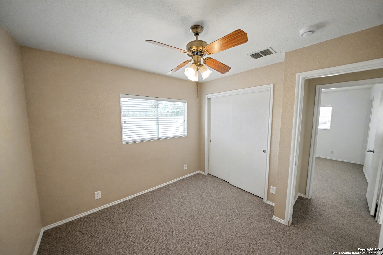 3615 Longhorn Creek San Antonio, TX 78261 - Photo 33 of 42 a view of an empty room with a window