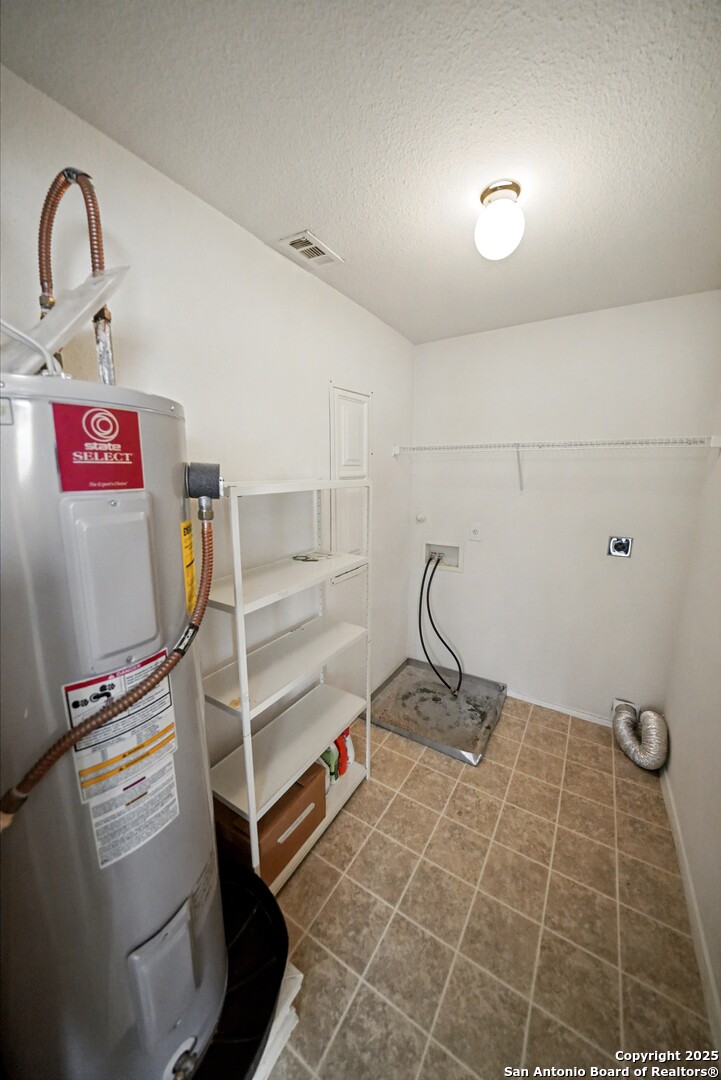 3615 Longhorn Creek San Antonio, TX 78261 - Photo 34 of 42 a bathroom with a sink and a shower