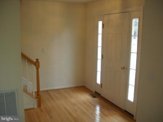 117 Hess Road Grasonville, MD 21638 - Photo 2 of 9 a view of empty room with wooden floor
