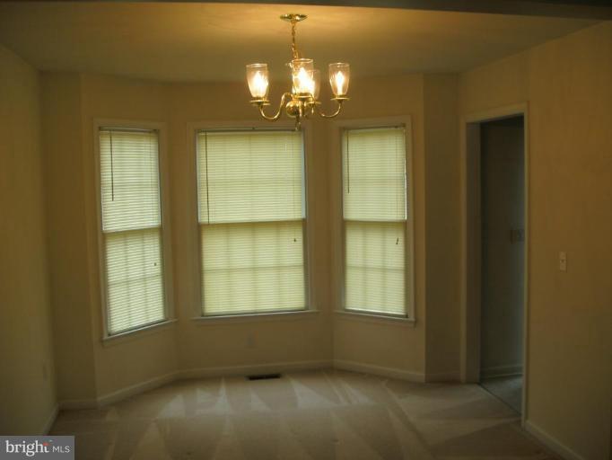 117 Hess Road Grasonville, MD 21638 - Photo 4 of 9 a view of a windows in an empty room