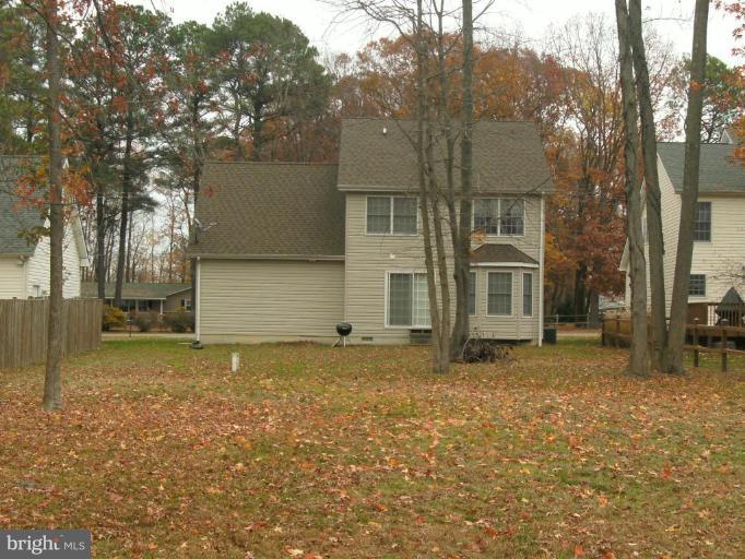 117 Hess Road Grasonville, MD 21638 - Photo 9 of 9 a view of a house with a yard