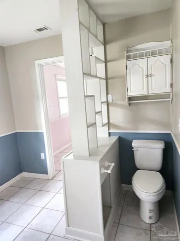 a kitchen with a cabinets and window