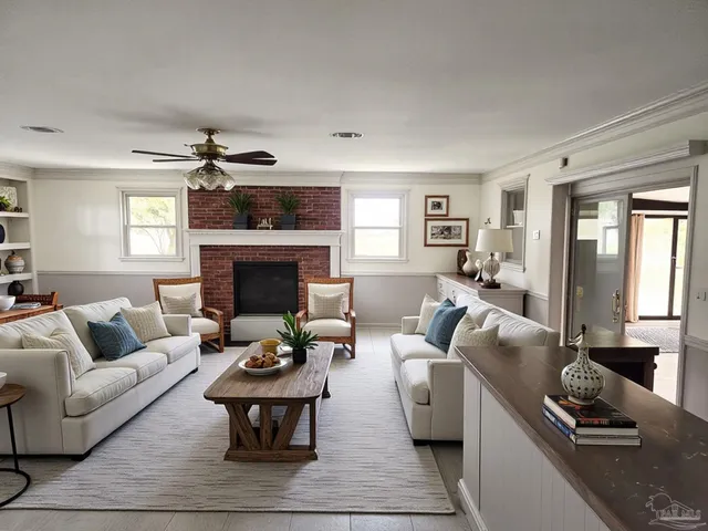 a living room with furniture and a fireplace