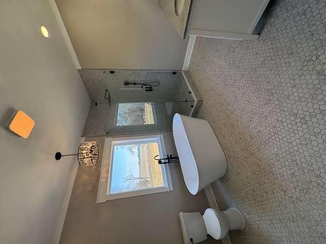 1825 County Road 40, AL 35960 - Photo 11 of 24 a bathroom with a toilet a sink and mirror