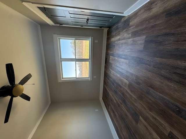 1825 County Road 40, AL 35960 - Photo 16 of 24 a view of an empty room with wooden floor and a window