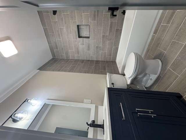 1825 County Road 40, AL 35960 - Photo 19 of 24 a bathroom with a sink a toilet and shower