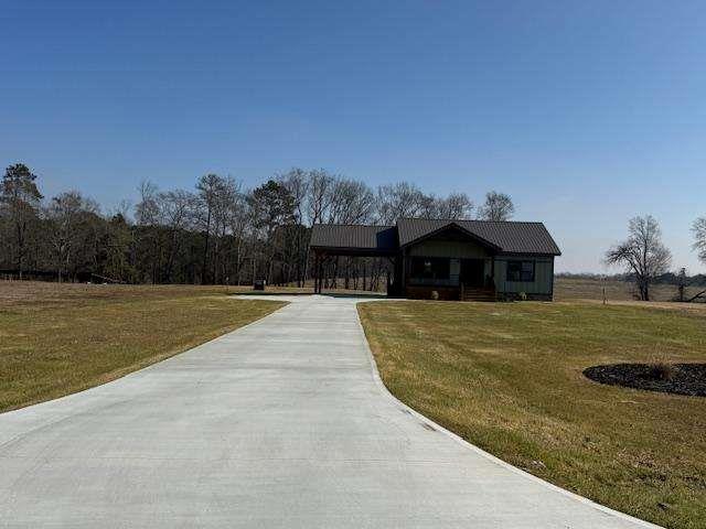 1825 County Road 40, AL 35960 - Photo 2 of 24 a view of a house with swimming pool