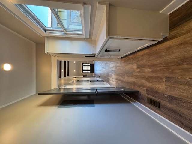 1825 County Road 40, AL 35960 - Photo 21 of 24 a hallway with wooden floor closet and livingroom