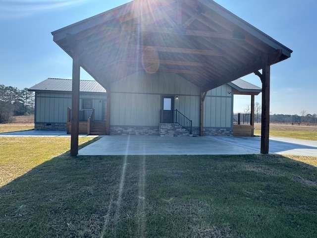 1825 County Road 40, AL 35960 - Photo 23 of 24 a view of a backyard of the house