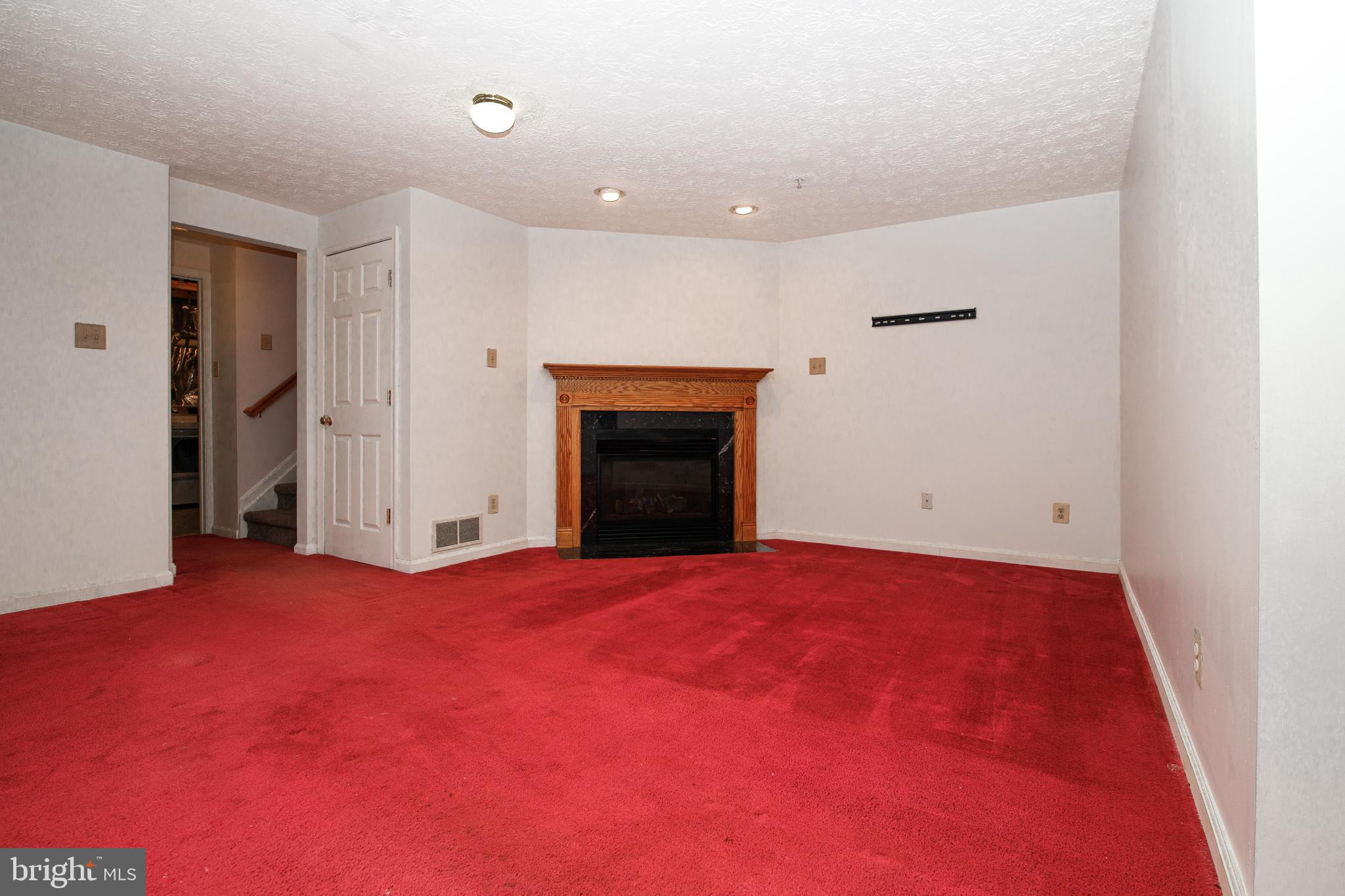 504 Buttonwoods Road Elkton, MD 21921 - Photo 16 of 23 Gas fireplace in basement family room