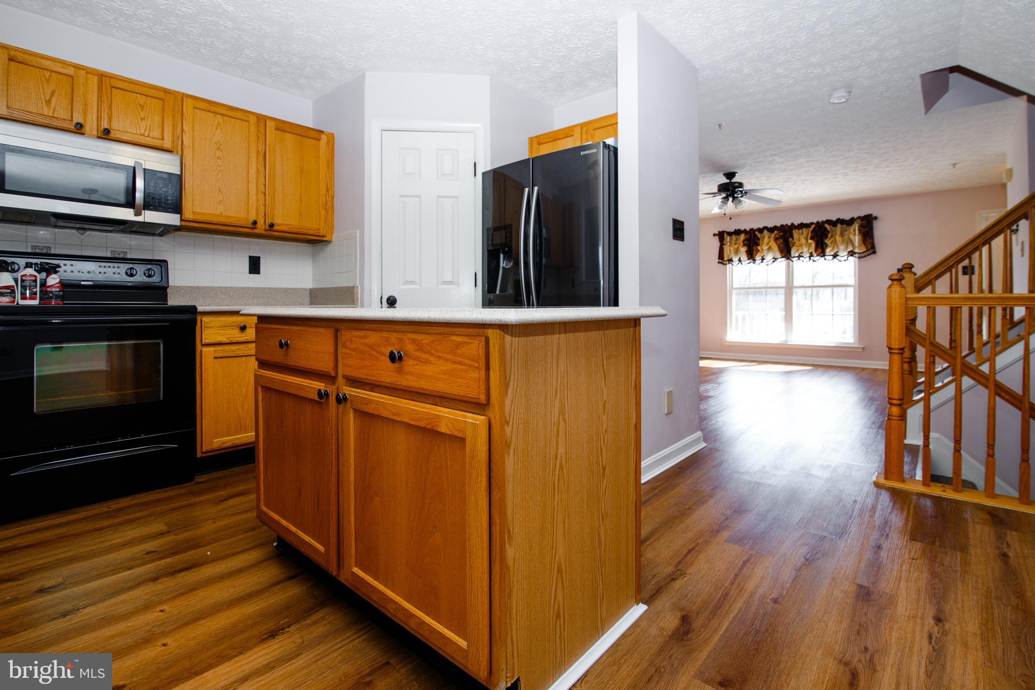 504 Buttonwoods Road Elkton, MD 21921 - Photo 7 of 23 Granite counter tops and large pantry