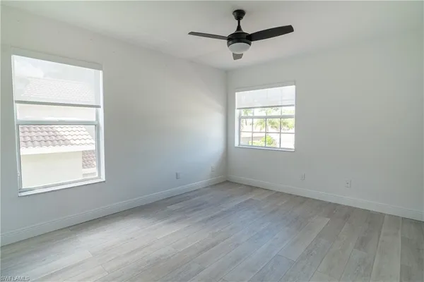 a view of a city with lawn chairs