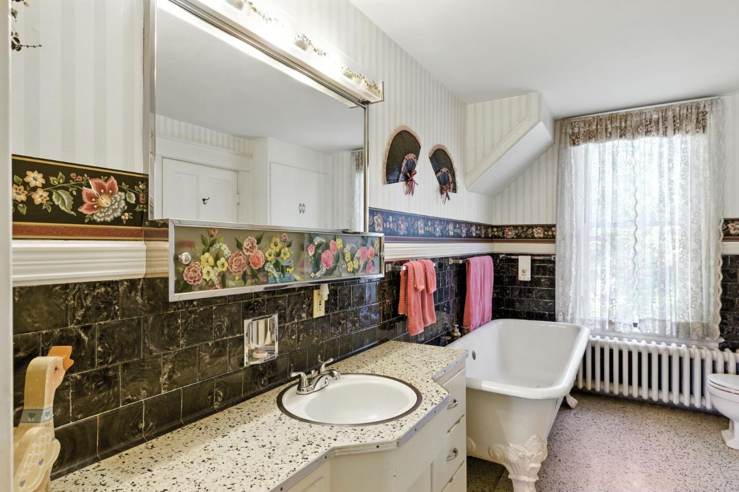 1330 Jackson Gate Road Jackson, CA 95642 - Photo 25 of 72 a bathroom with a sink mirror and toilet
