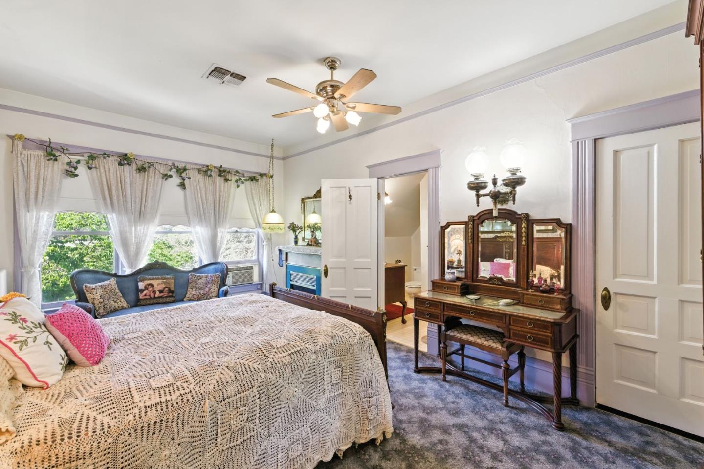 1330 Jackson Gate Road Jackson, CA 95642 - Photo 32 of 72 a bedroom with a bed dresser and a window