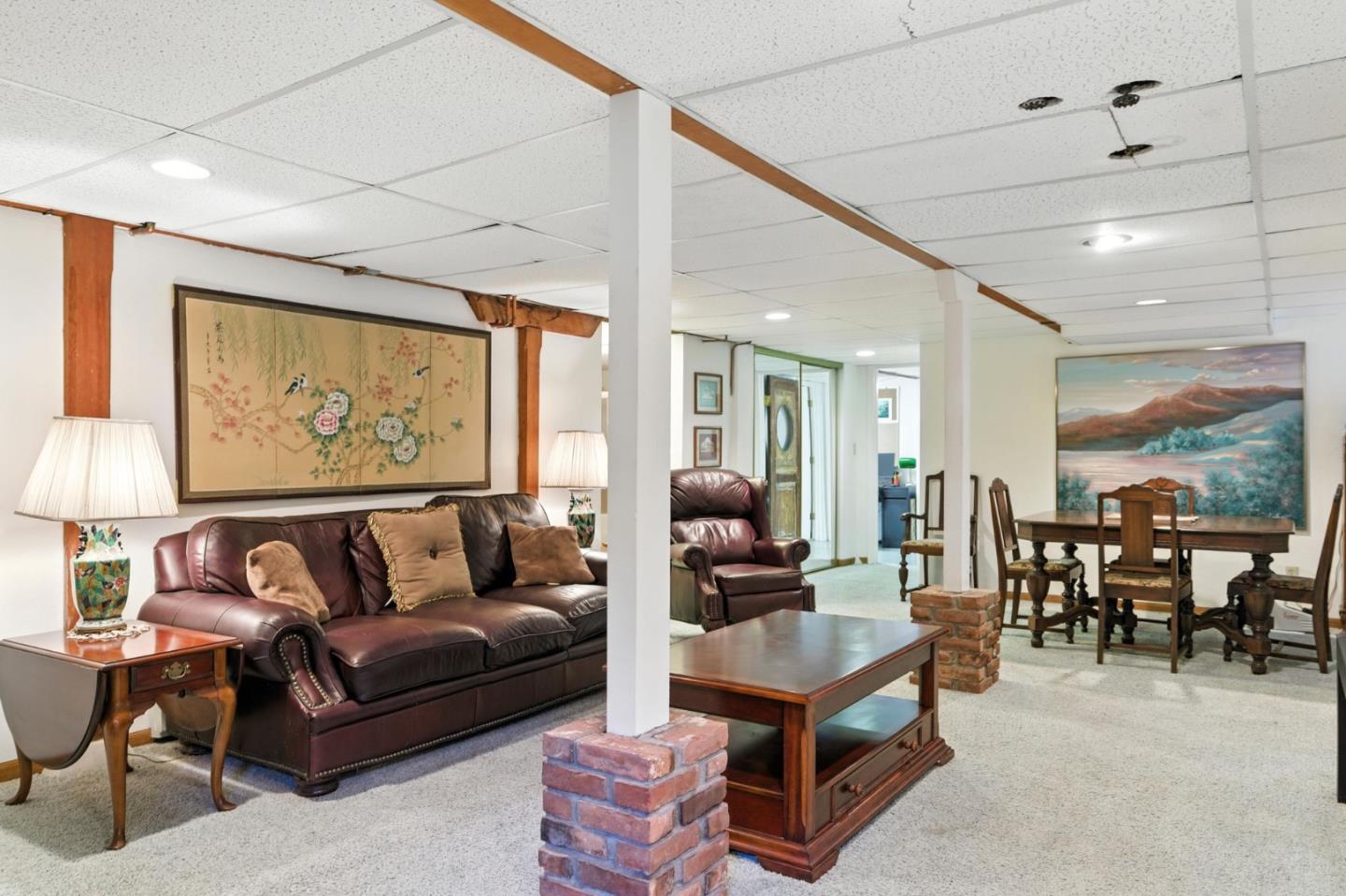 1330 Jackson Gate Road Jackson, CA 95642 - Photo 50 of 72 a living room with furniture a rug and a large window