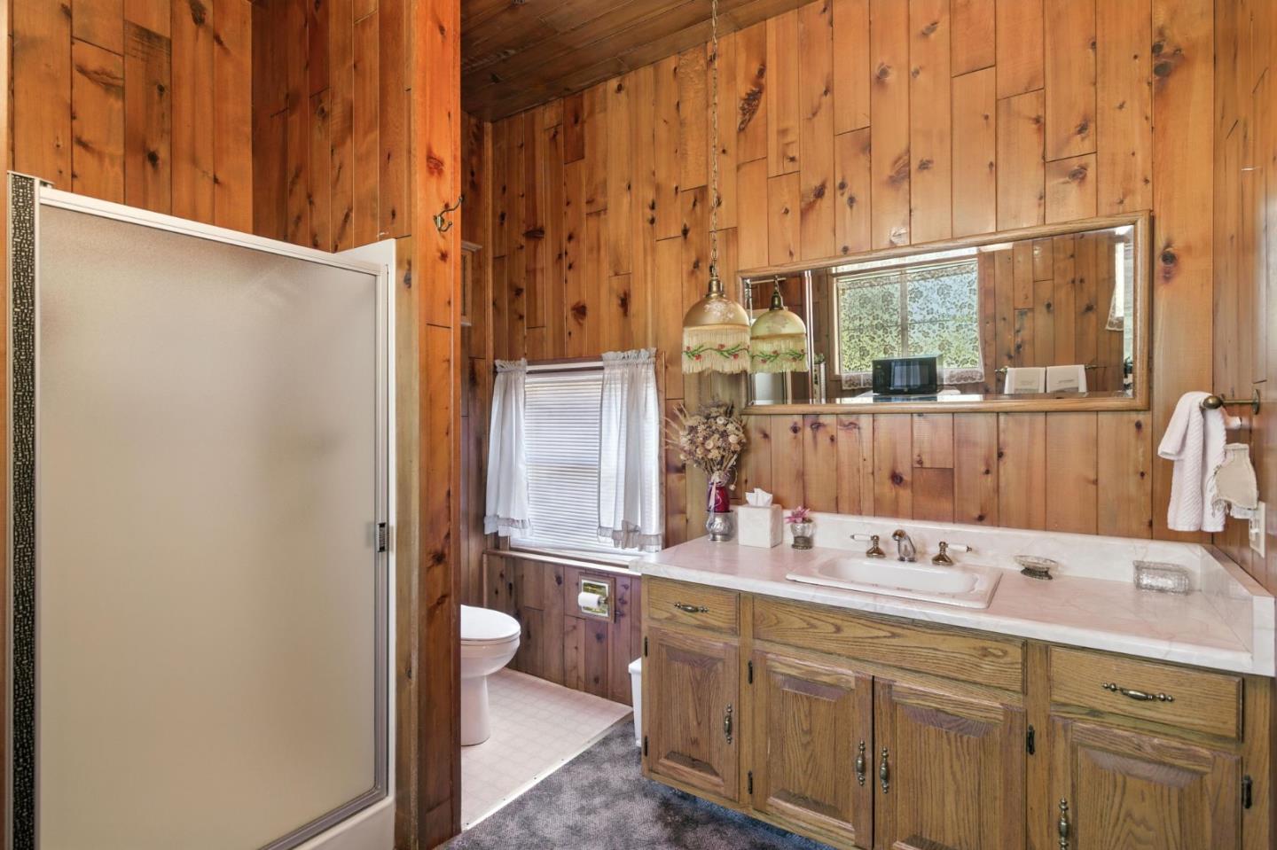 1330 Jackson Gate Road Jackson, CA 95642 - Photo 64 of 72 a bathroom with a double vanity sink and a mirror