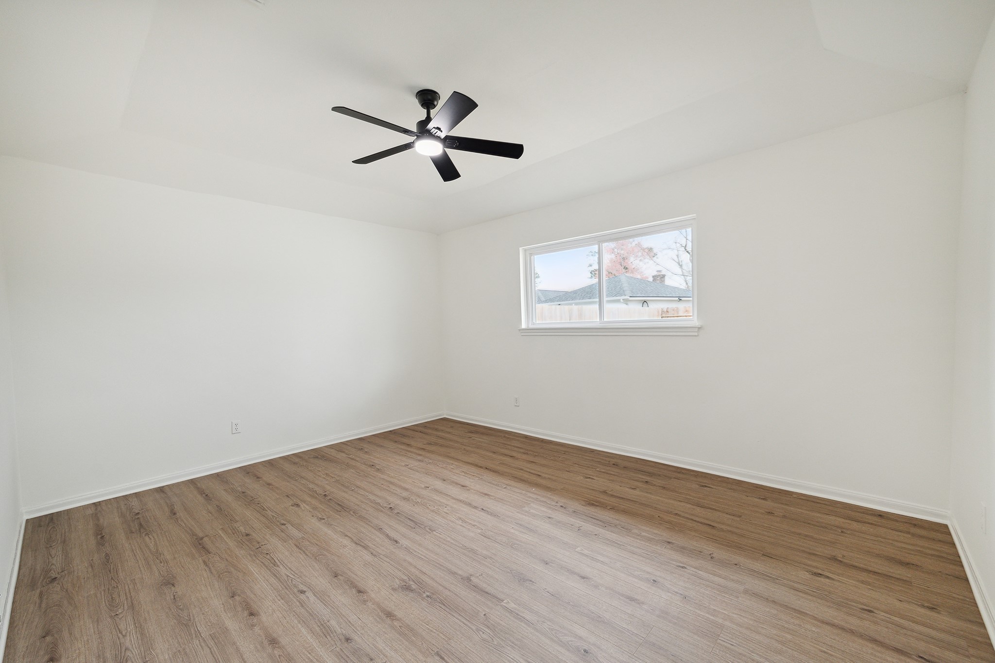 9719 Springmont Drive Houston, TX 77080 - Photo 20 of 32 Master bedroom is a quiet oasis!! Tray ceiling expands the space! Plenty big for that California king bed!!