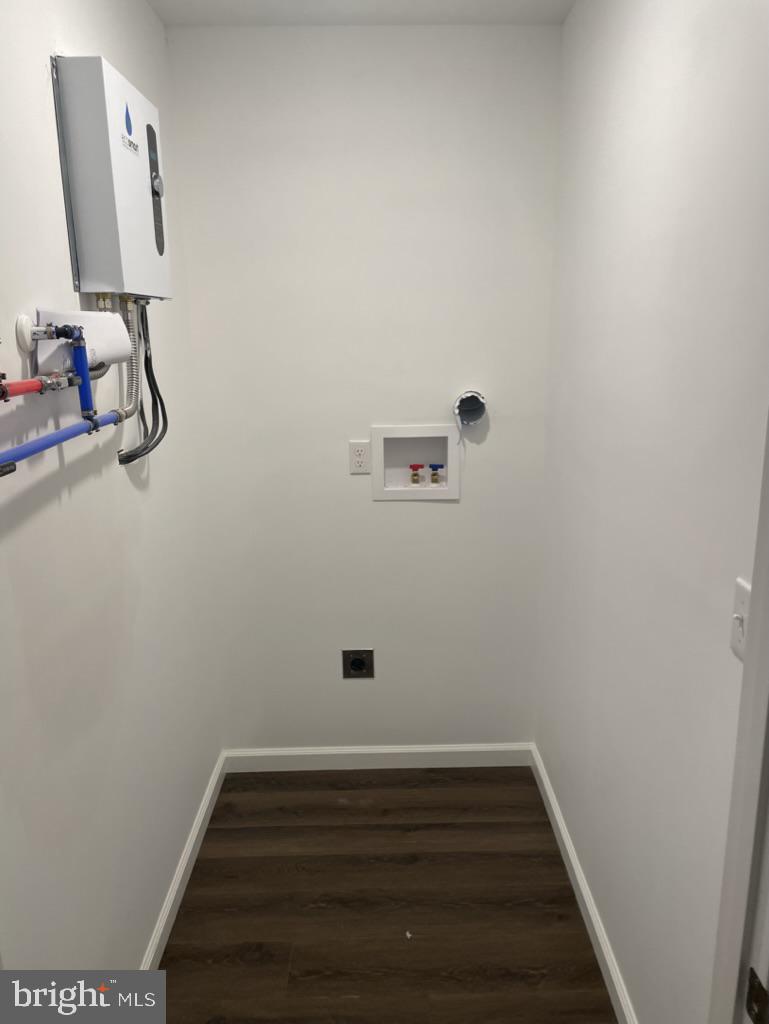300 Collins Avenue, Unit 3 Hurlock, MD 21643 - Photo 11 of 13 a view of small space with racks on the wall