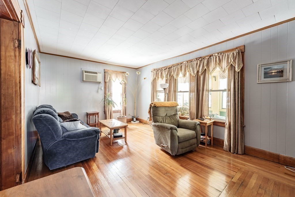 27 Freeman Terrace Springfield, MA 01104 - Photo 22 of 32 a living room with furniture and a large window