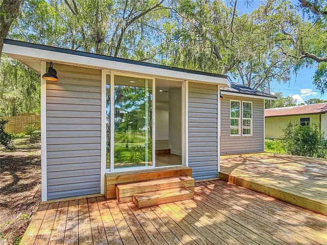 a view of a backyard with a garden and plants