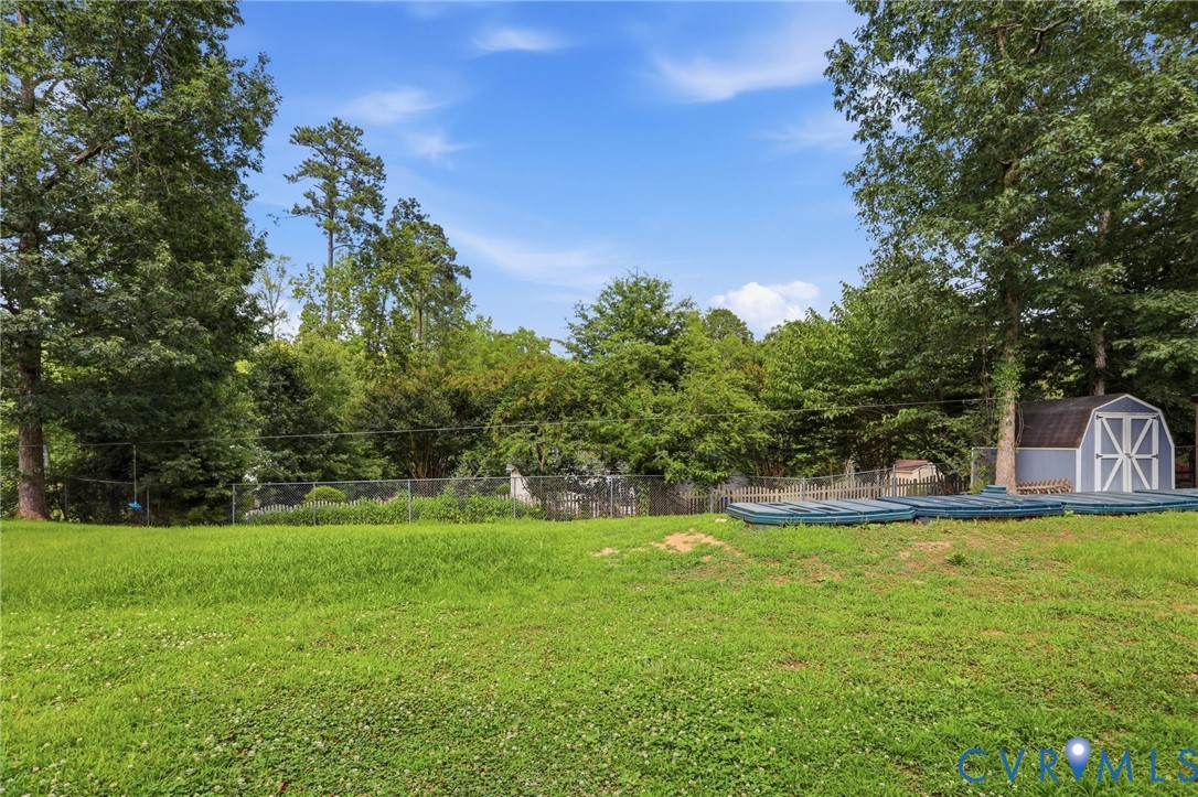 14420 Branding Iron Road Chesterfield, VA 23838 - Photo 43 of 50 Expansive lawn area featuring a chain-link fence,