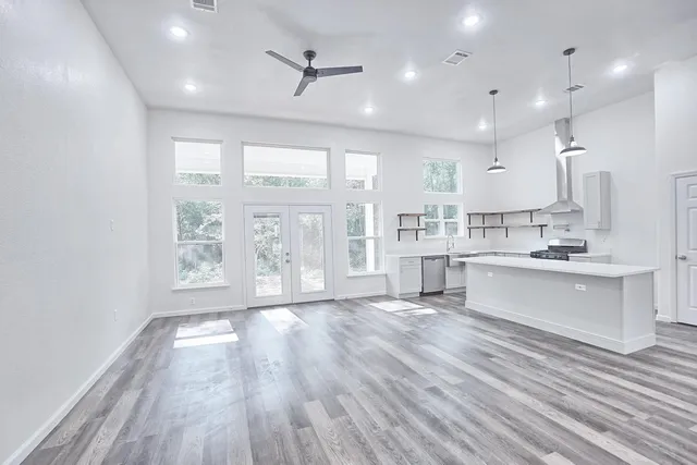 a view of kitchen with wooden floor and window