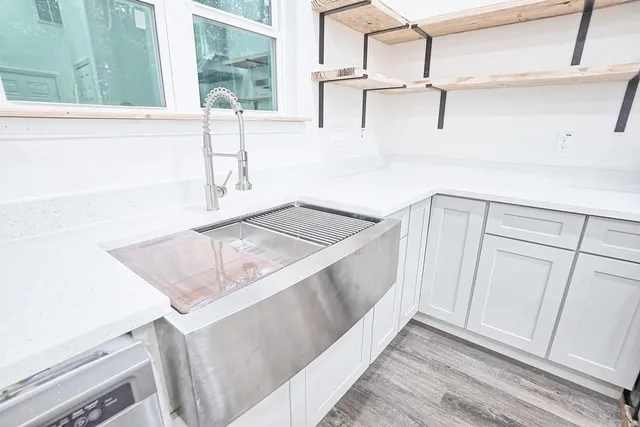 a view of a kitchen from a sink