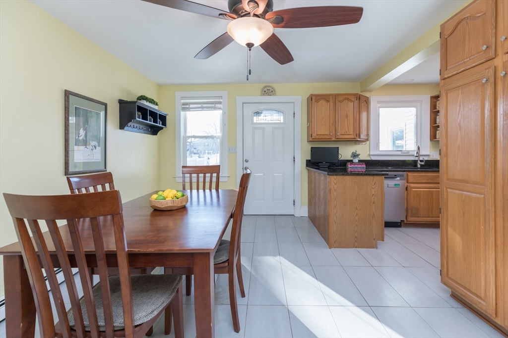 215 Central Street Saugus, MA 01906 - Photo 11 of 41 a view of a dining room with furniture window and wooden floor