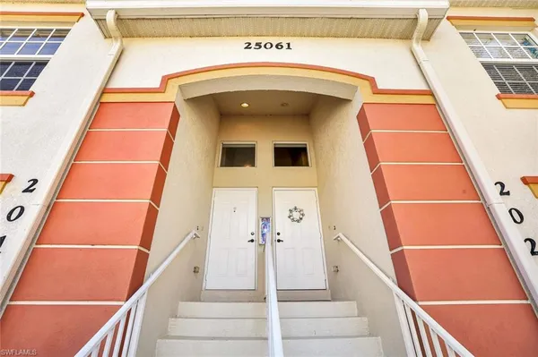 a view of a balcony with door