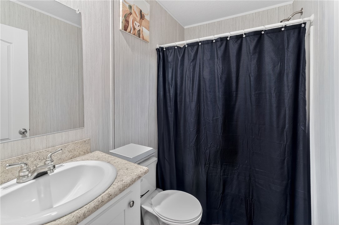 862 North Old Mill Road Easley, SC 29640 - Photo 14 of 24 This clean bathroom features a convenient vanity with a sink and an integrated shower.