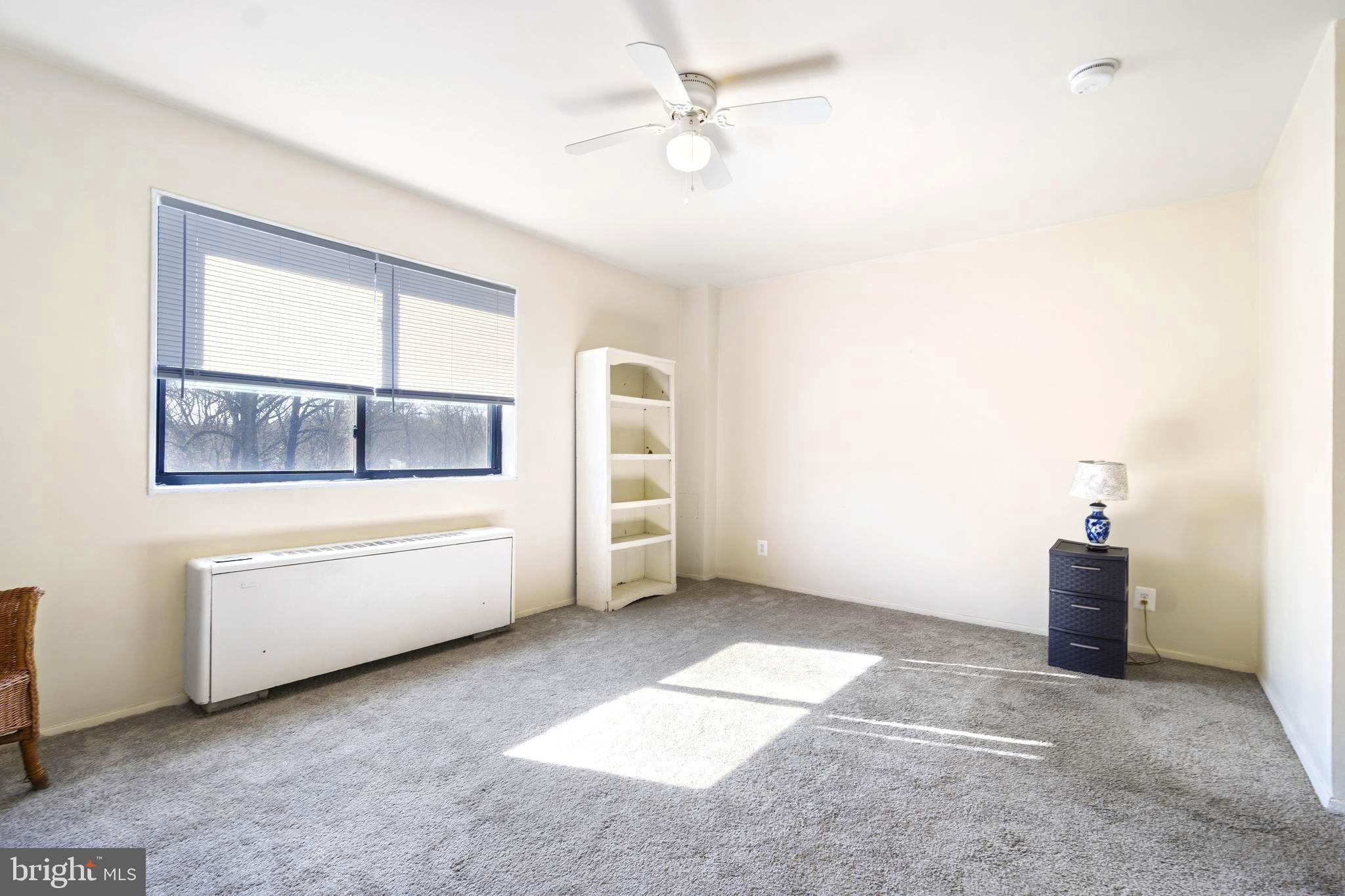 8601 Manchester Road, Unit 513 Silver Spring, MD 20901 - Photo 16 of 31 a view of an empty room with a window