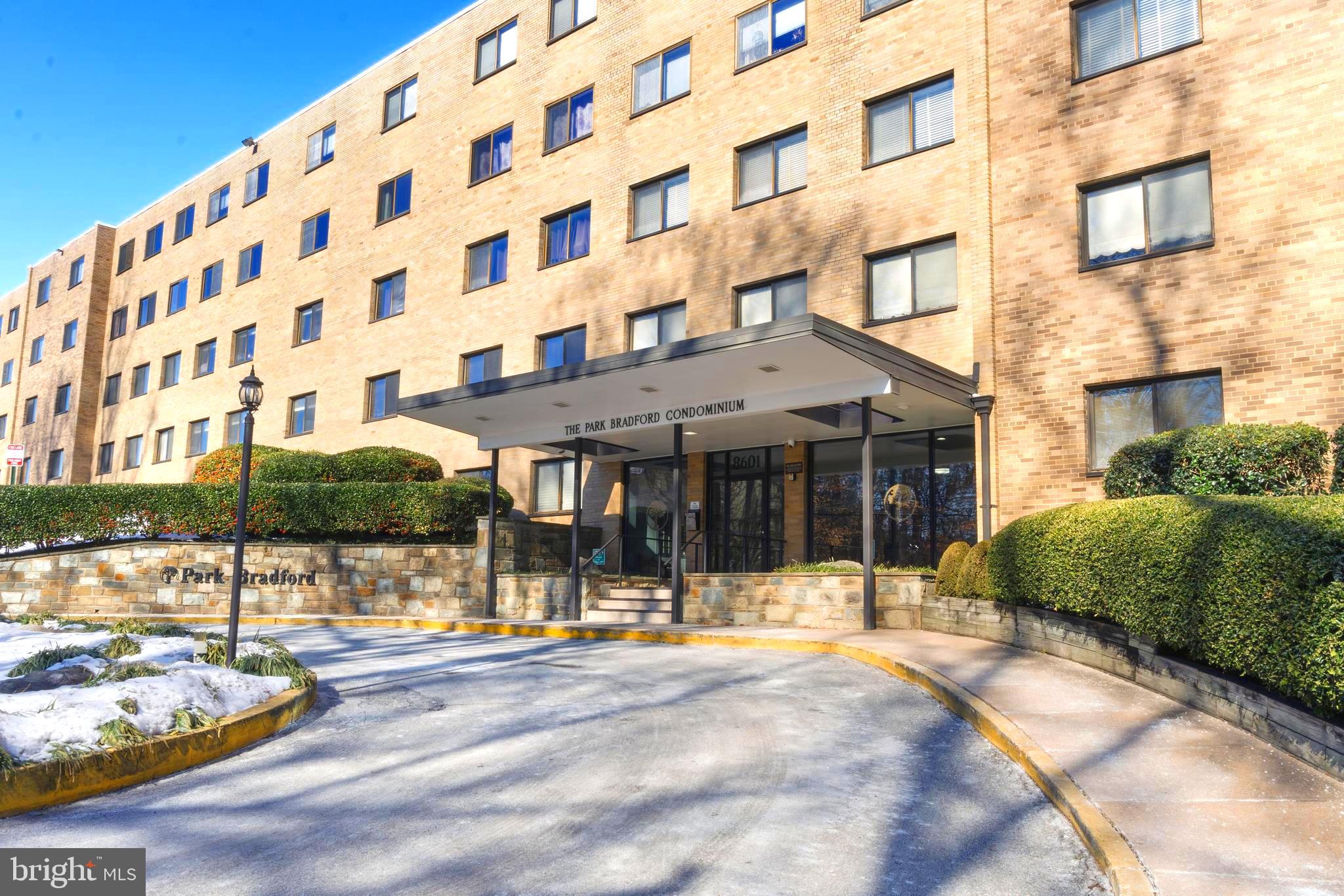 8601 Manchester Road, Unit 513 Silver Spring, MD 20901 - Photo 20 of 31 a view of a building with a outdoor space