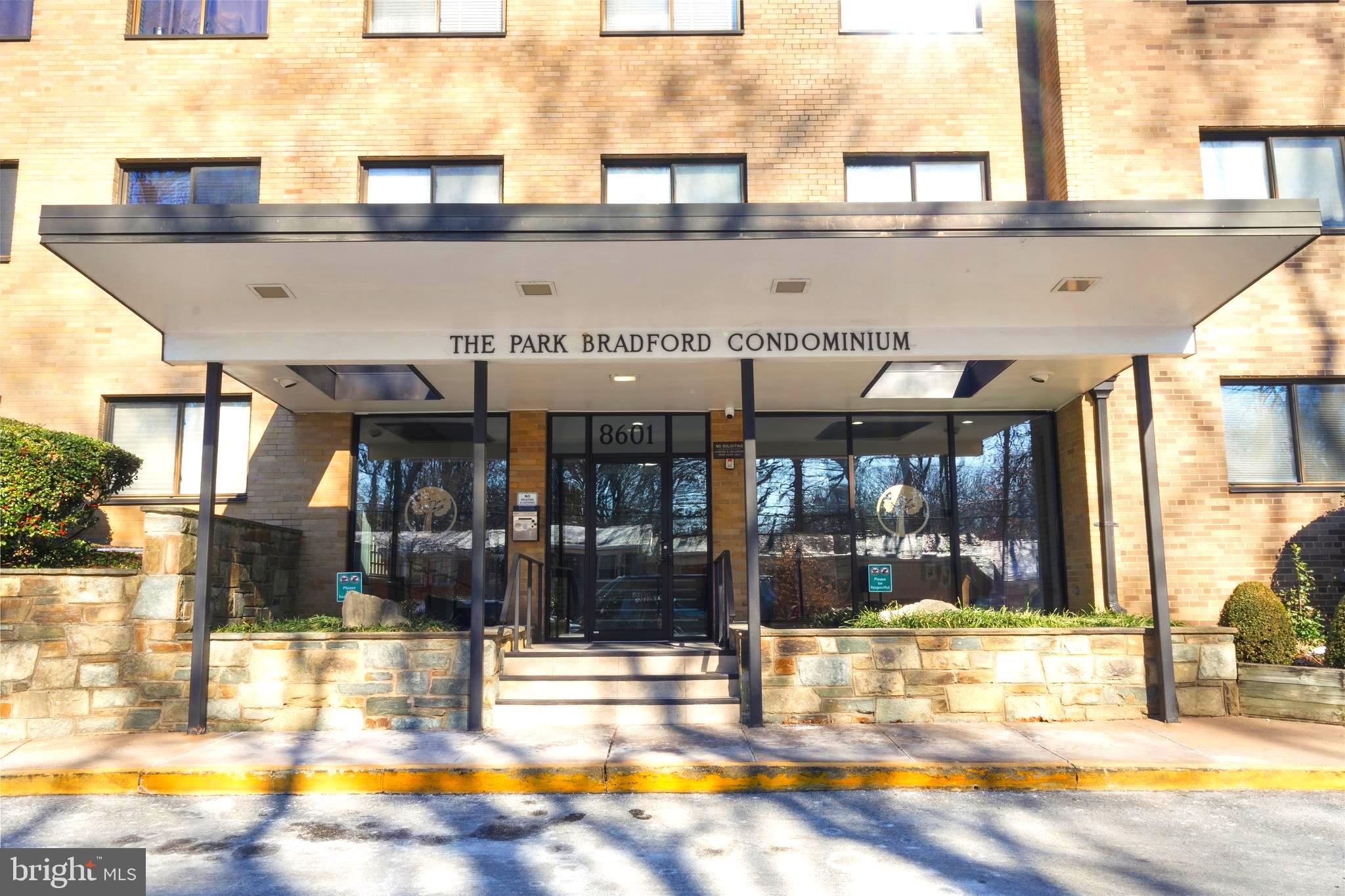 8601 Manchester Road, Unit 513 Silver Spring, MD 20901 - Photo 21 of 31 a view of a swimming pool with a outdoor seating
