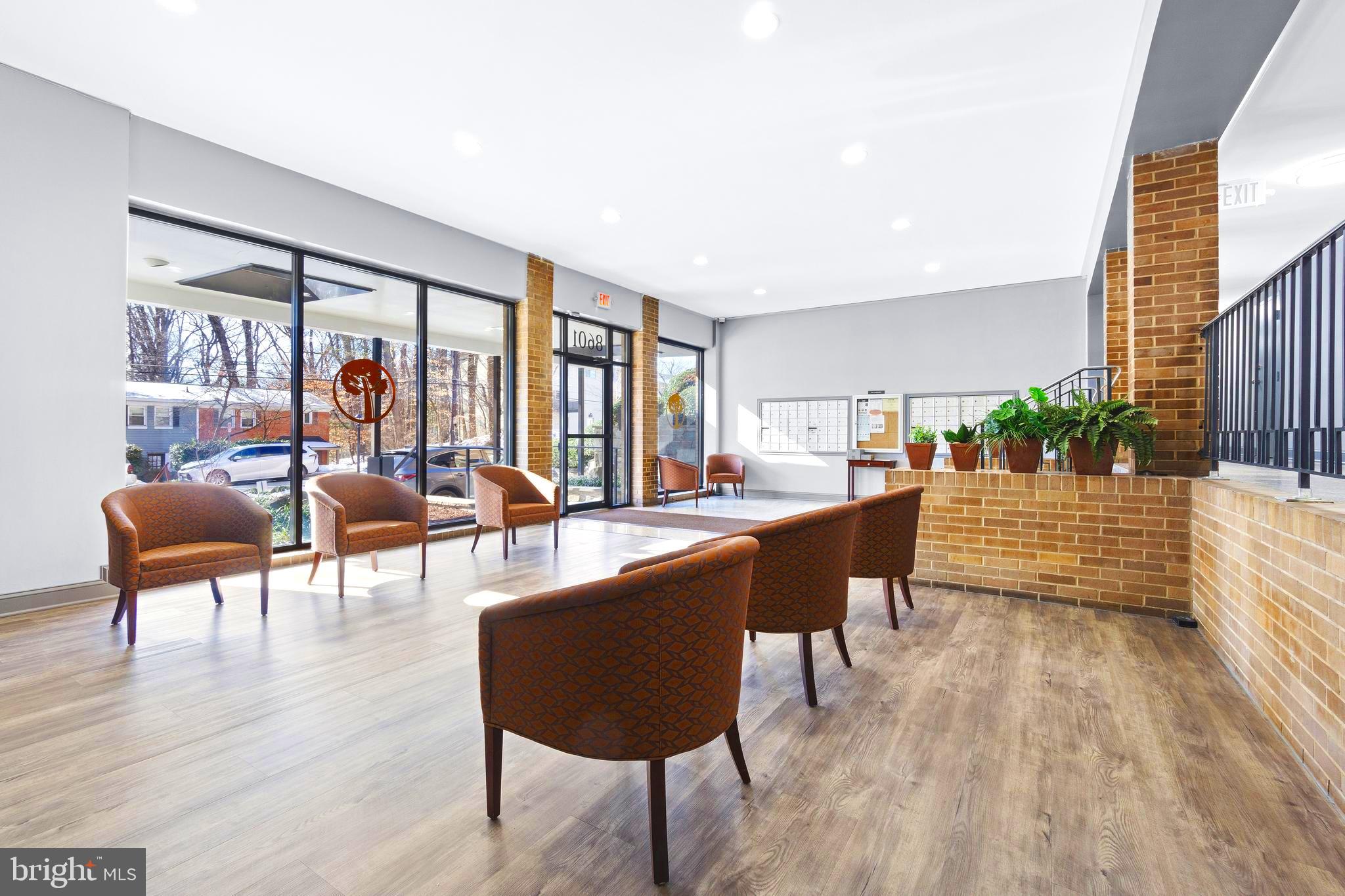 8601 Manchester Road, Unit 513 Silver Spring, MD 20901 - Photo 23 of 31 a living room with furniture and a large window