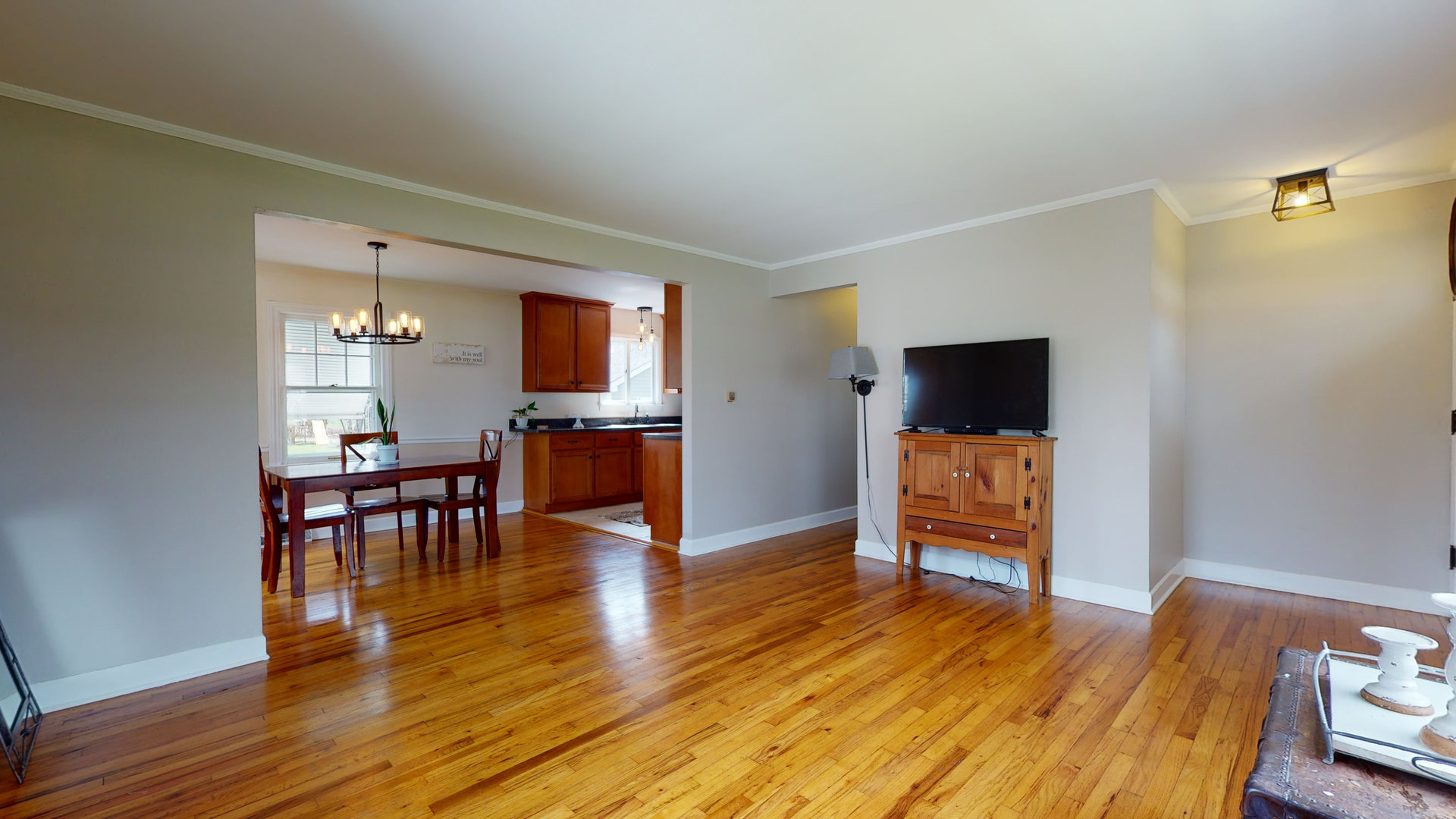 26W529 Geneva Road Wheaton, IL 60187 - Photo 6 of 15 a living room with furniture and a flat screen tv