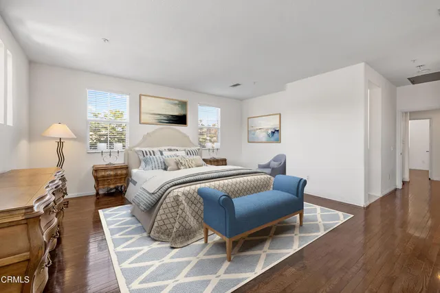 a bedroom with furniture