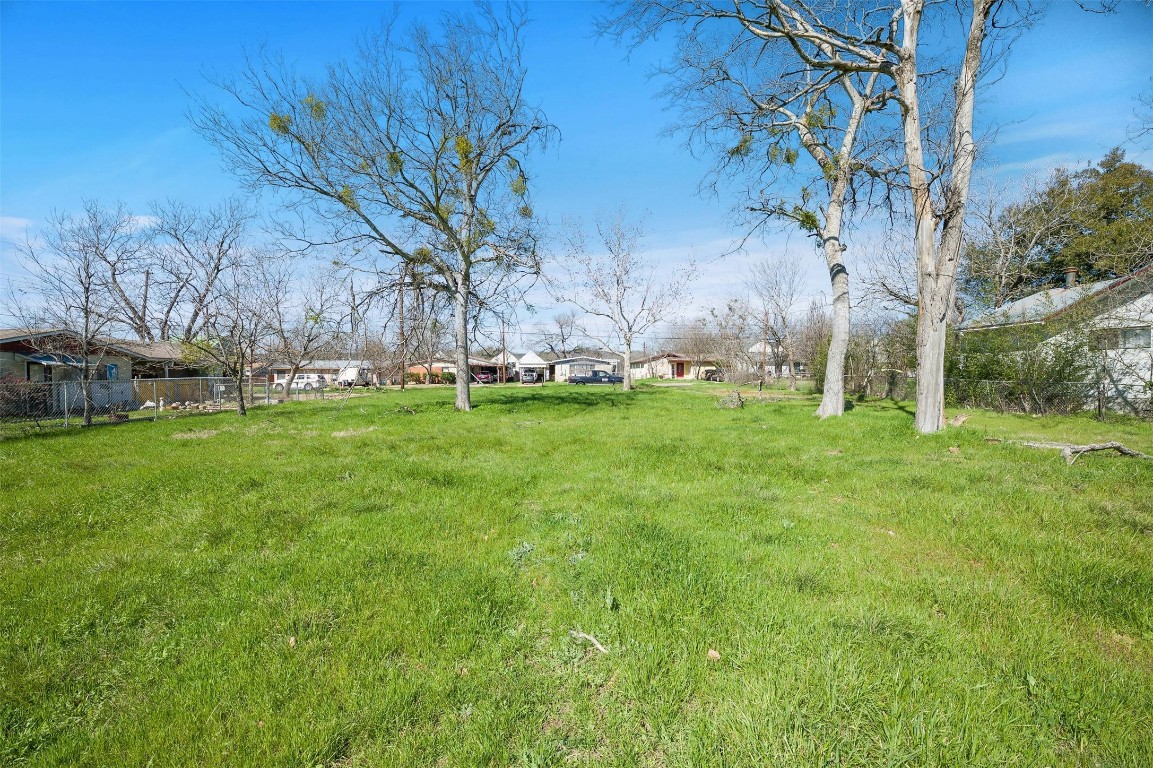 4518 South 2nd Street Austin, TX 78745 - Photo 12 of 37 a backyard of a house with lots of green space