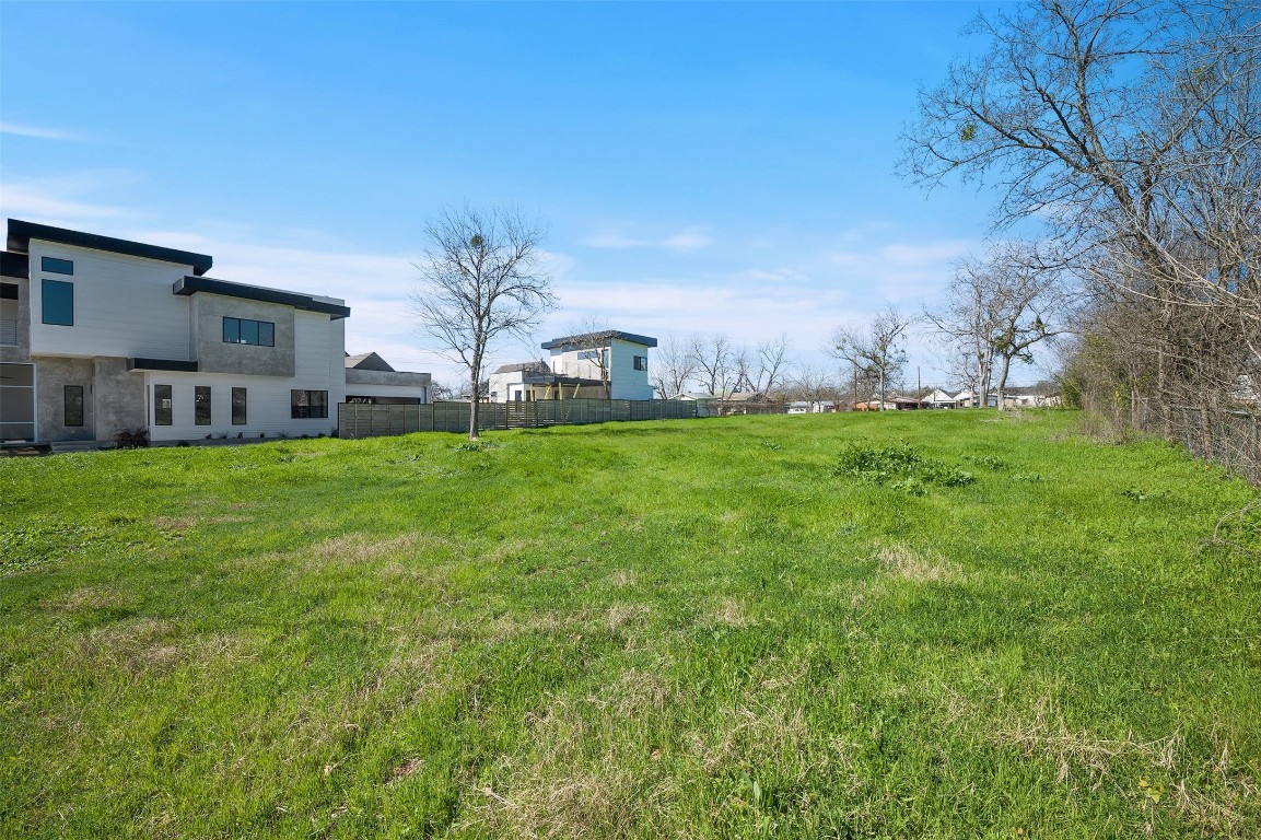 4518 South 2nd Street Austin, TX 78745 - Photo 13 of 37 a view of a house with a big yard and large trees