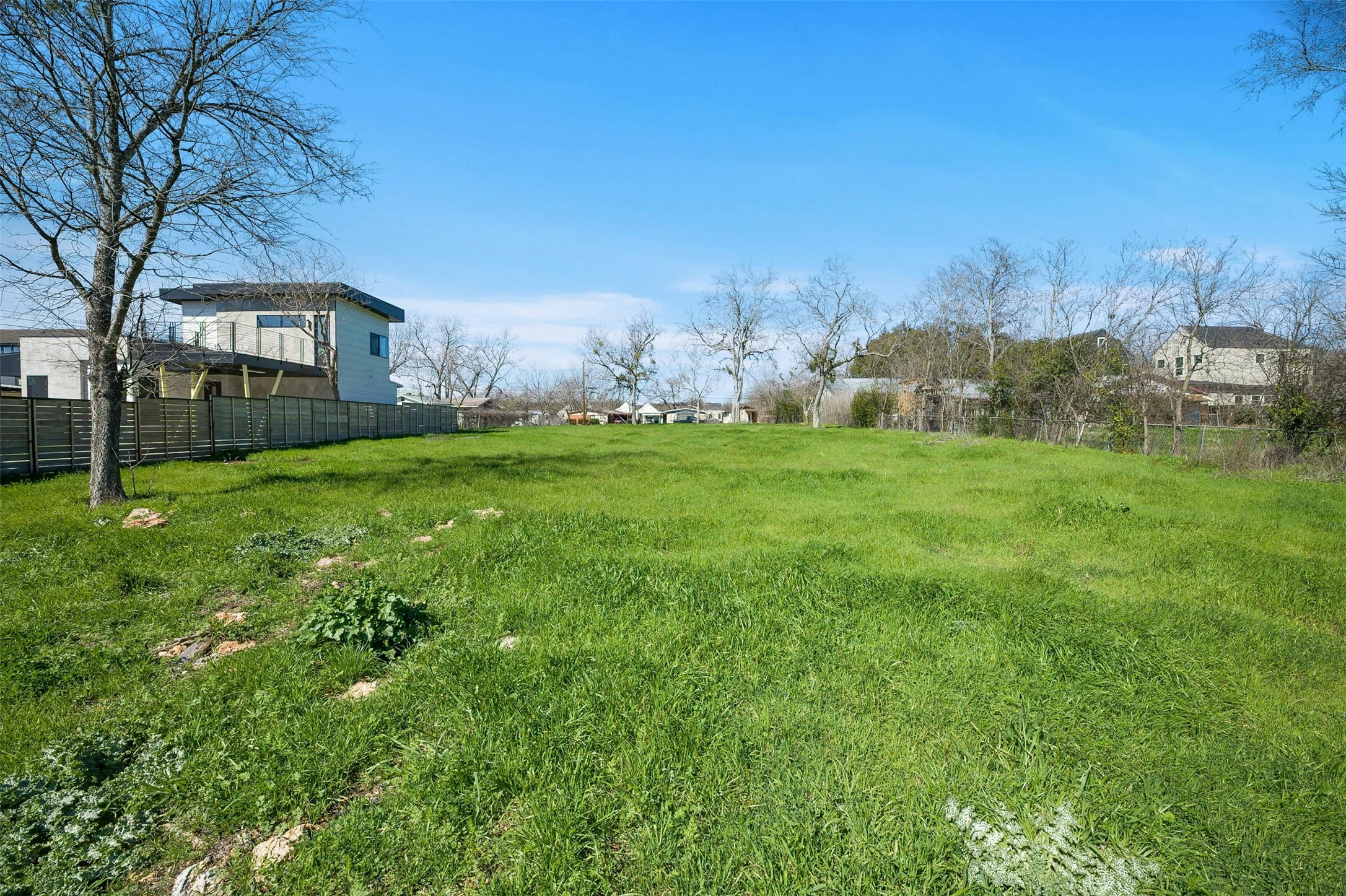 4518 South 2nd Street Austin, TX 78745 - Photo 14 of 37 a view of a field of grass and trees