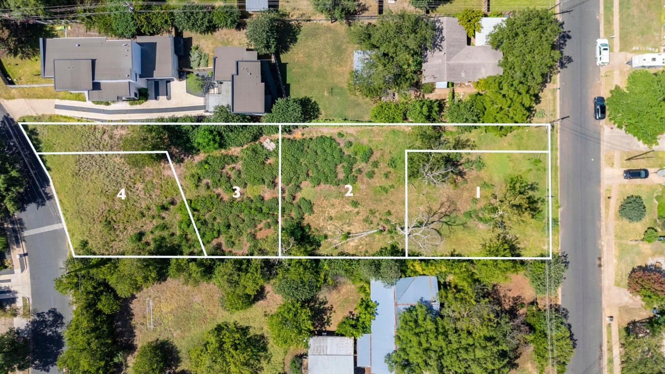4518 South 2nd Street Austin, TX 78745 - Photo 2 of 37 an aerial view of a swimming pool with a yard