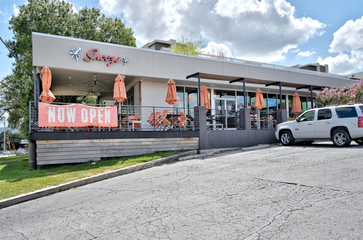 4518 South 2nd Street Austin, TX 78745 - Photo 34 of 37 a front view of a building with parking space