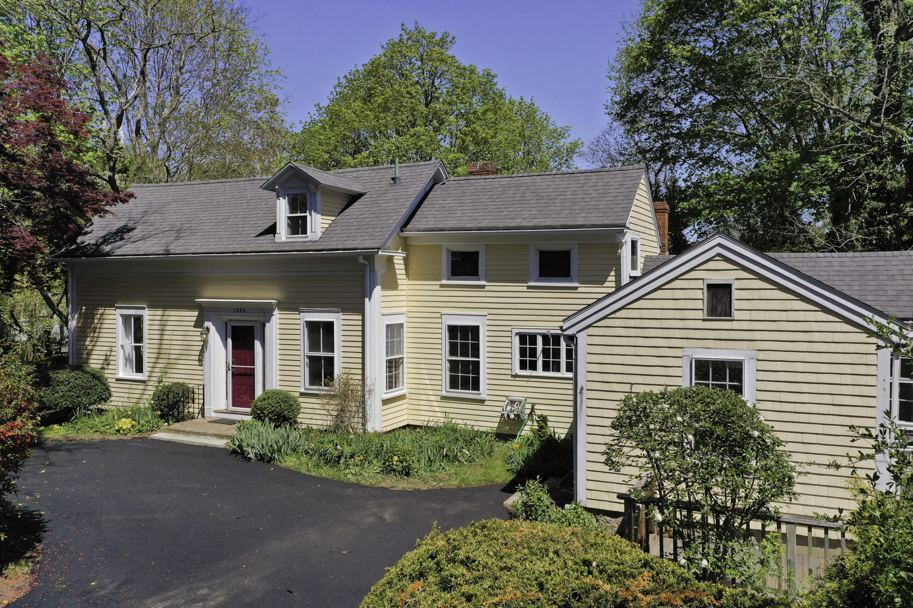 1295 County Road Cataumet, MA 02534 - Photo 1 of 16 front view of a house with a yard