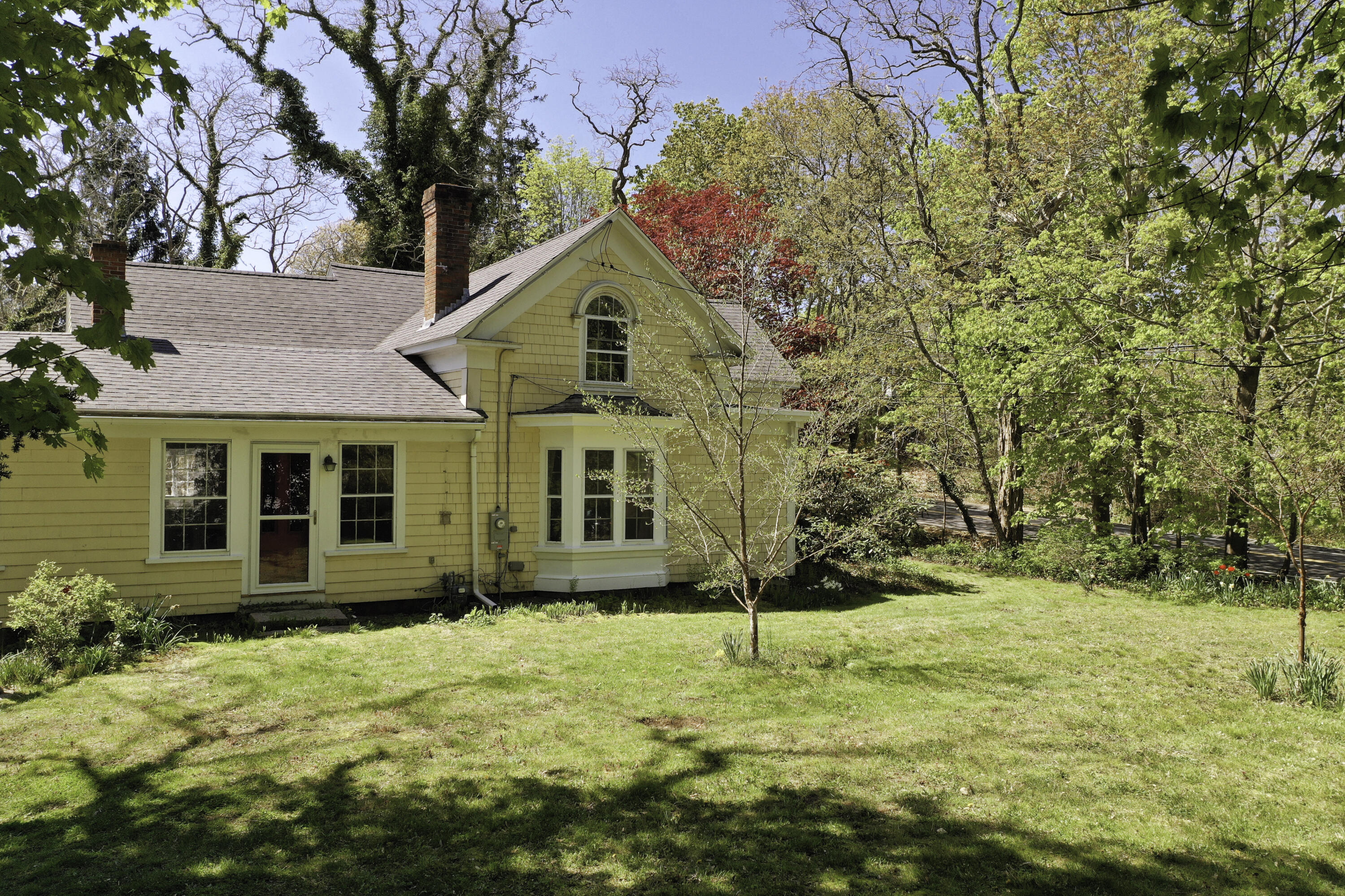 1295 County Road Cataumet, MA 02534 - Photo 3 of 16 a view of a house with a yard
