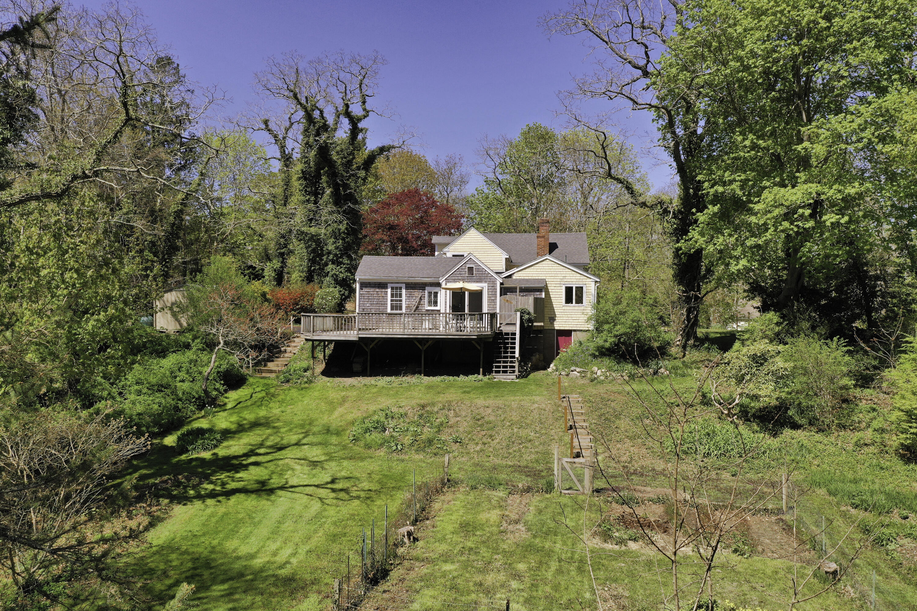 1295 County Road Cataumet, MA 02534 - Photo 4 of 16 a view of a house with a yard
