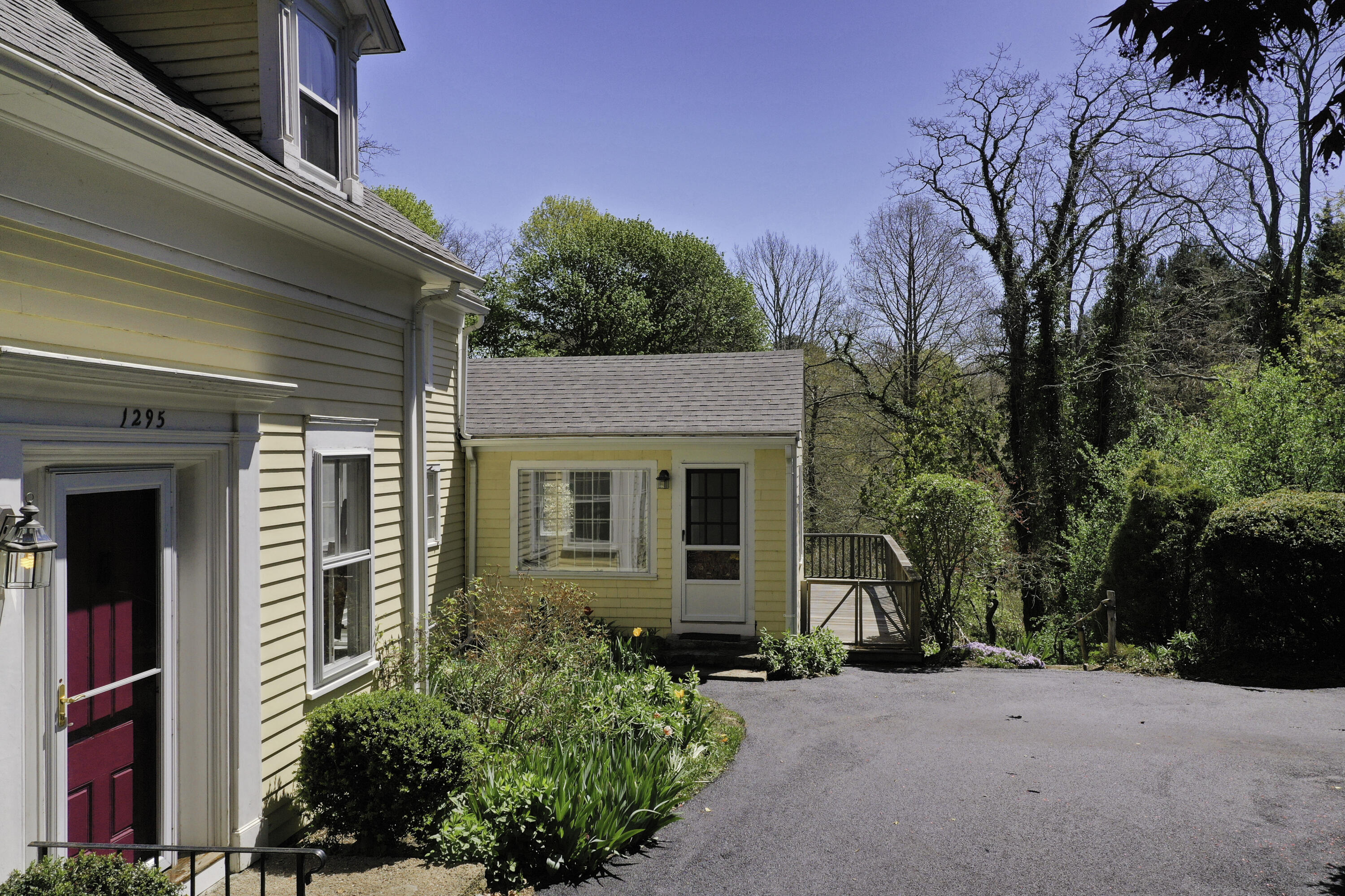 1295 County Road Cataumet, MA 02534 - Photo 5 of 16 front view of a house with a street