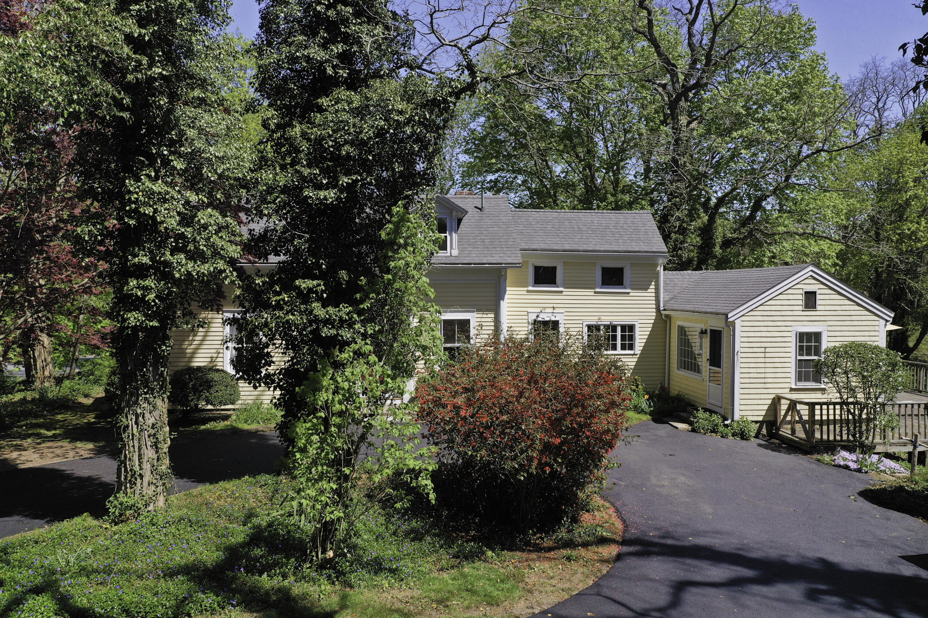 1295 County Road Cataumet, MA 02534 - Photo 6 of 16 a front view of a house with garden