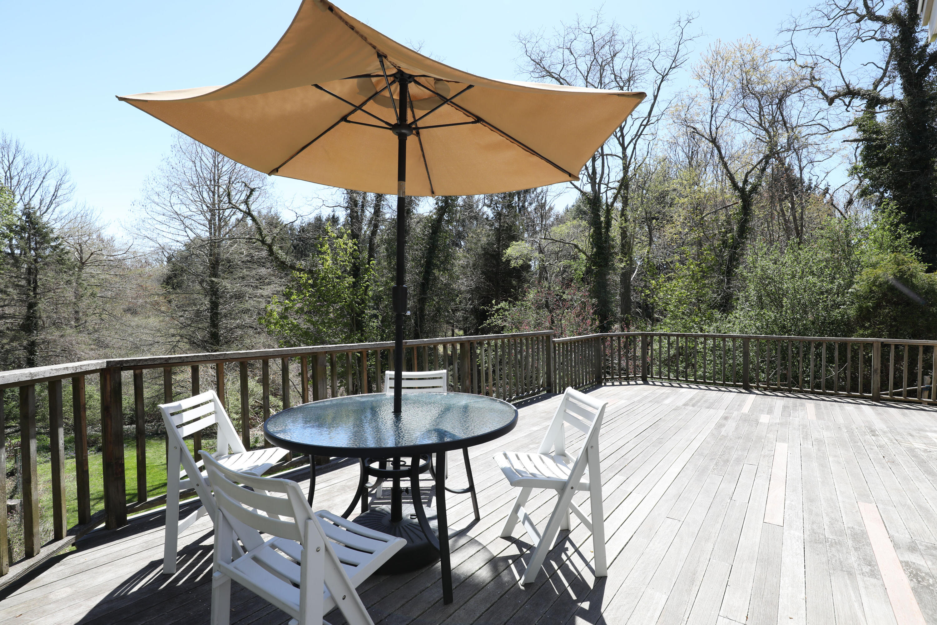 1295 County Road Cataumet, MA 02534 - Photo 8 of 16 a view of a chair and table on the deck