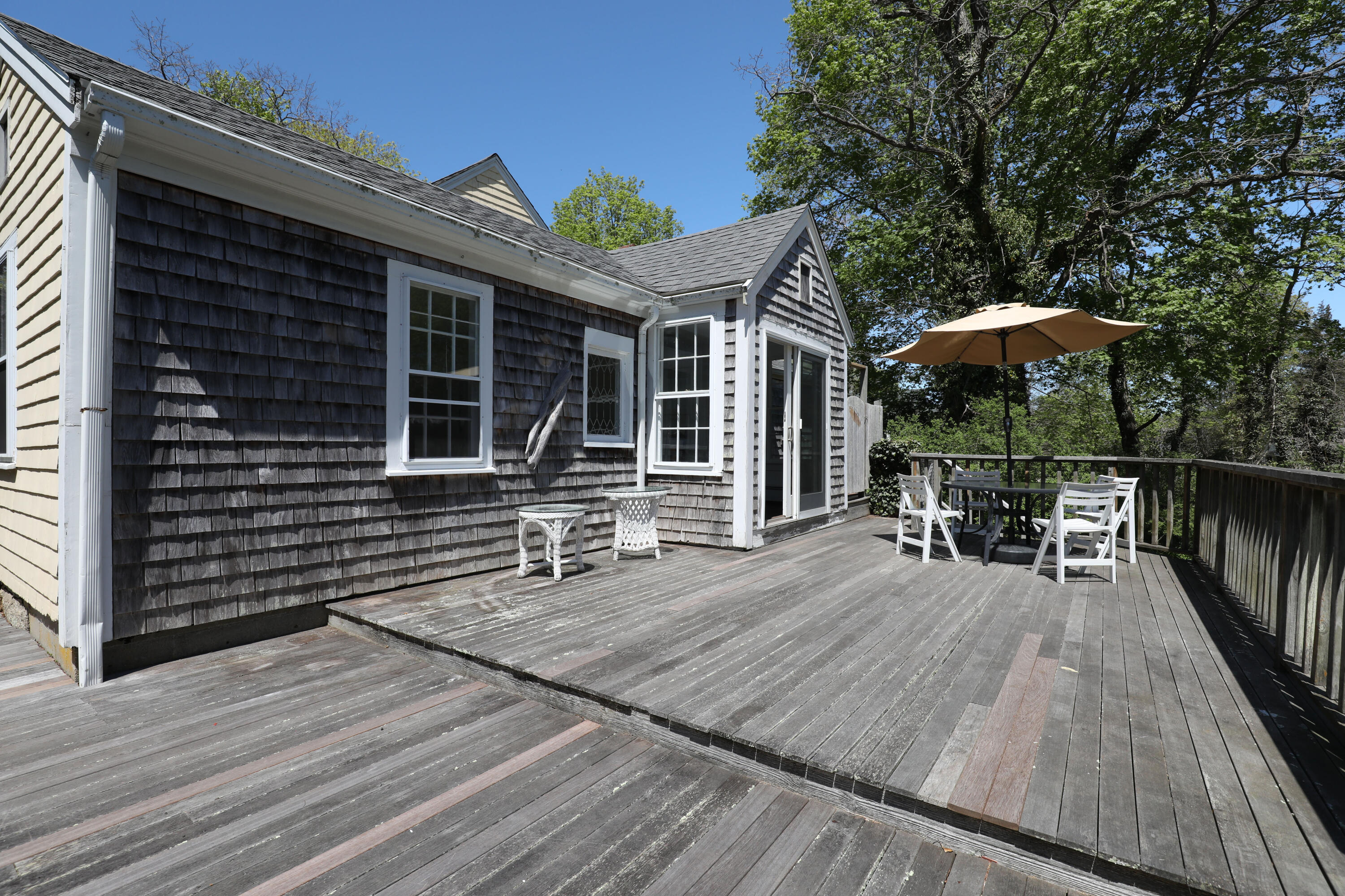 1295 County Road Cataumet, MA 02534 - Photo 10 of 16 a view of a house with backyard and sitting area