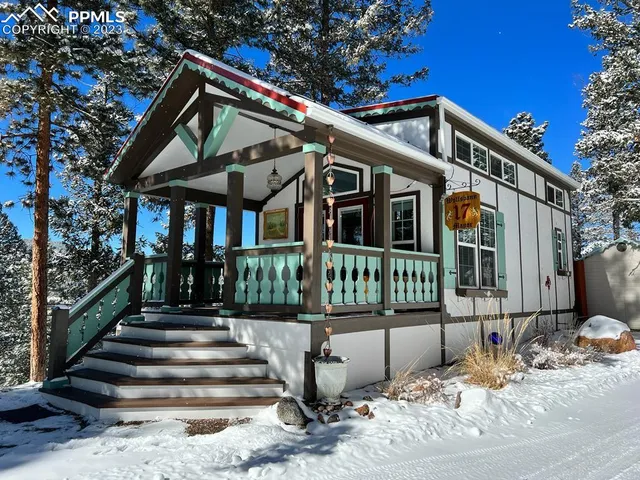 a view of a chair and tables in the patio
